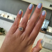 טבעת זהב 14K משובצת אבן אמרלד ויהלומים 0.65 קראט