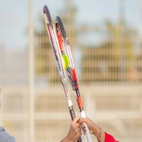 שיעור טניס זוגי - על המגרש ומעבר לו