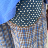 מכנסיים מדגם נור עם משבצות בחום וכחול