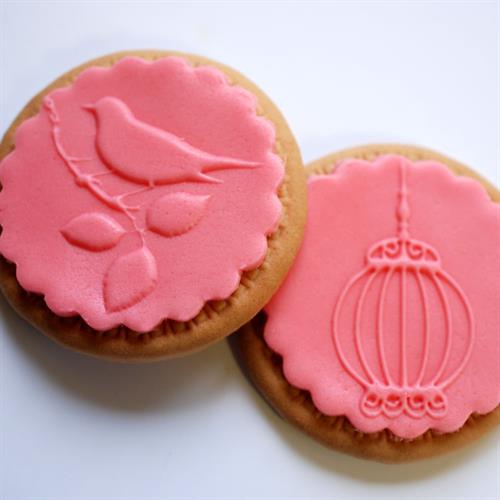 סט תבליטים - ציפור וכלוב.