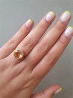 טבעת זהב משובצת אבן בלו טופז ויהלומים 0.25 קראט