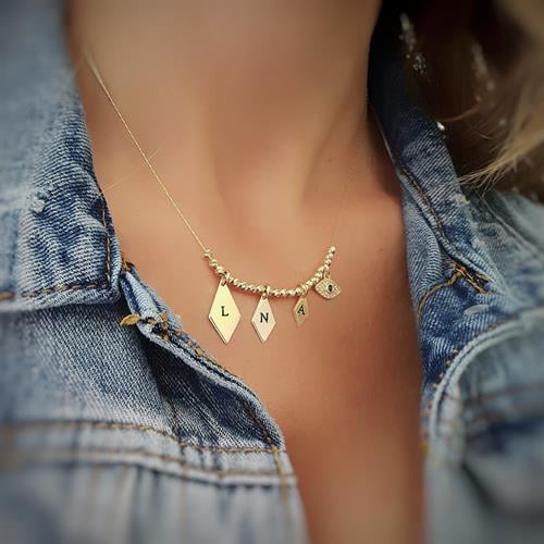 שרשרת מעויינים עם חרוזים ועין