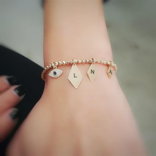 ​צמיד מעויינים עם חרוזים ועין 👁