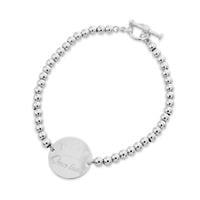 צמיד למלכה עם פלטה עגולה וחריטה