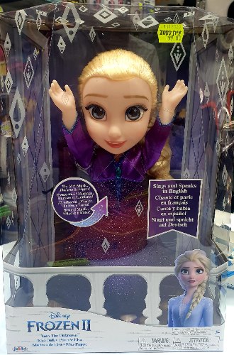 בובת פרוזן שרה ומנגנת