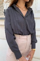 מכופתרת קלייר