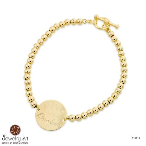 צמיד למלכה עם פלטה עגולה וחריטה