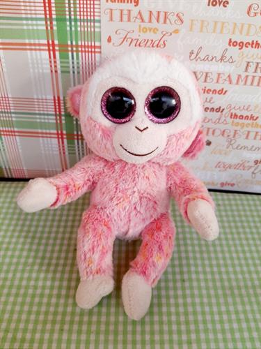 בובת קוף עיניים גדולות