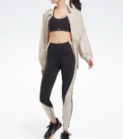 נשים | REEBOK COLLARED COVER UP