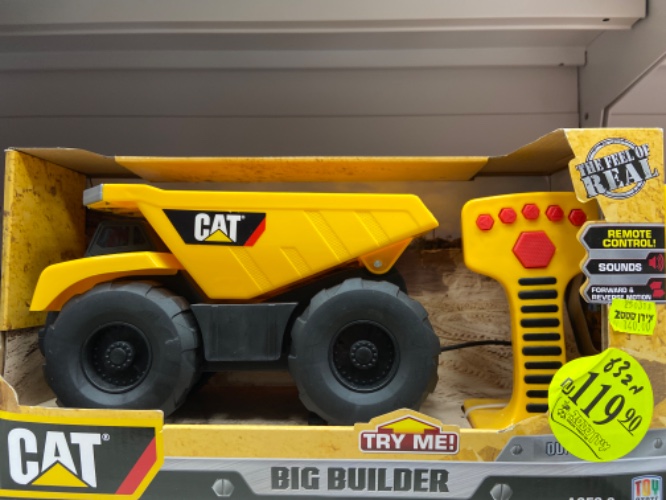 משאית בנייה על שלט - CAT