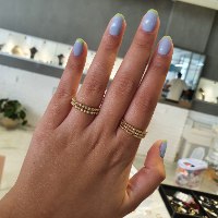 טבעת כדורים זהב שלוש שורות