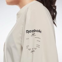 נשים | REEBOK COLLARED COVER UP