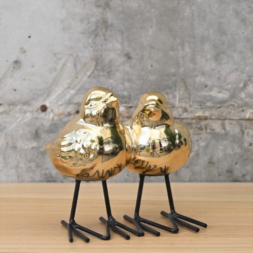 זוג ציפורים זהב מחוברות