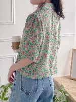 חולצת דורון פרחים טורקיז