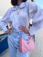 מכופתרת דול