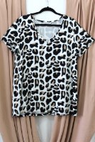 חולצת T SHIRT בילי מנומר לבן