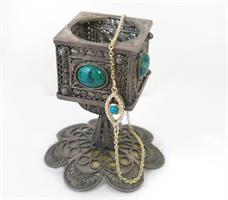 צמיד זהב עין הרעה משובץ יהלומים ואבן חן טורקיז