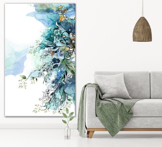 תמונה של עלים ירוקים מעל ספה אפורה