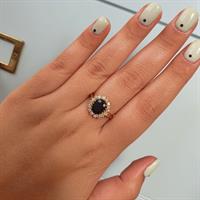 טבעת דגם דיאנה כחולה זהב 14 קראט עם זרקונים