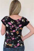 חולצת הריון חצי חצי- גב פרחוני וחזית שחורה בתוספת כיס פרחוני