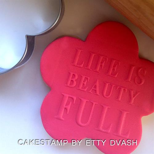 LIFE IS BEAUTIFUL - תבליט