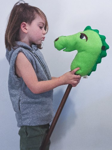 דינוזאור על מקל בצבע ירוק בהיר