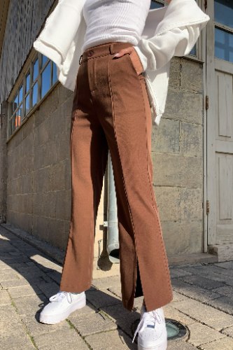 מכנסי טקסס מחויטים