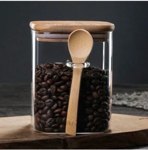 צנצנת זכוכית עם כפית במבוק