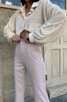 מכנסי טקסס מחויטים