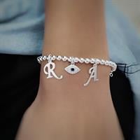 צמיד כדורים עין ואותיות