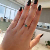 טבעת זהב אמרלד ויהלומים דגם 'טוויסט'