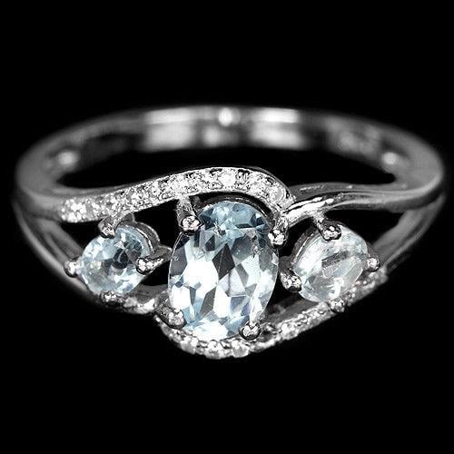 טבעת מכסף  משובצת אבני טופז כחולות וזרקונים RG8414 | תכשיטי כסף 925 | טבעות כסף